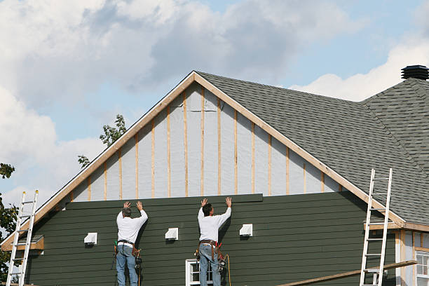 Professional Siding Replacement technician working in Russia, OH